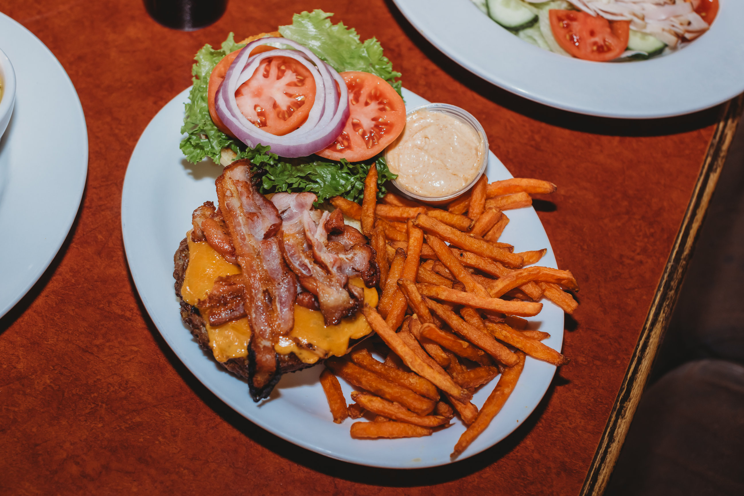 Bacon cheeseburger with sweet potato fries